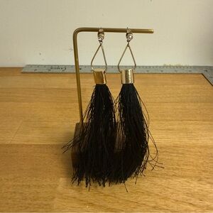 Black string tassel long dangle earrings with gold tone accents